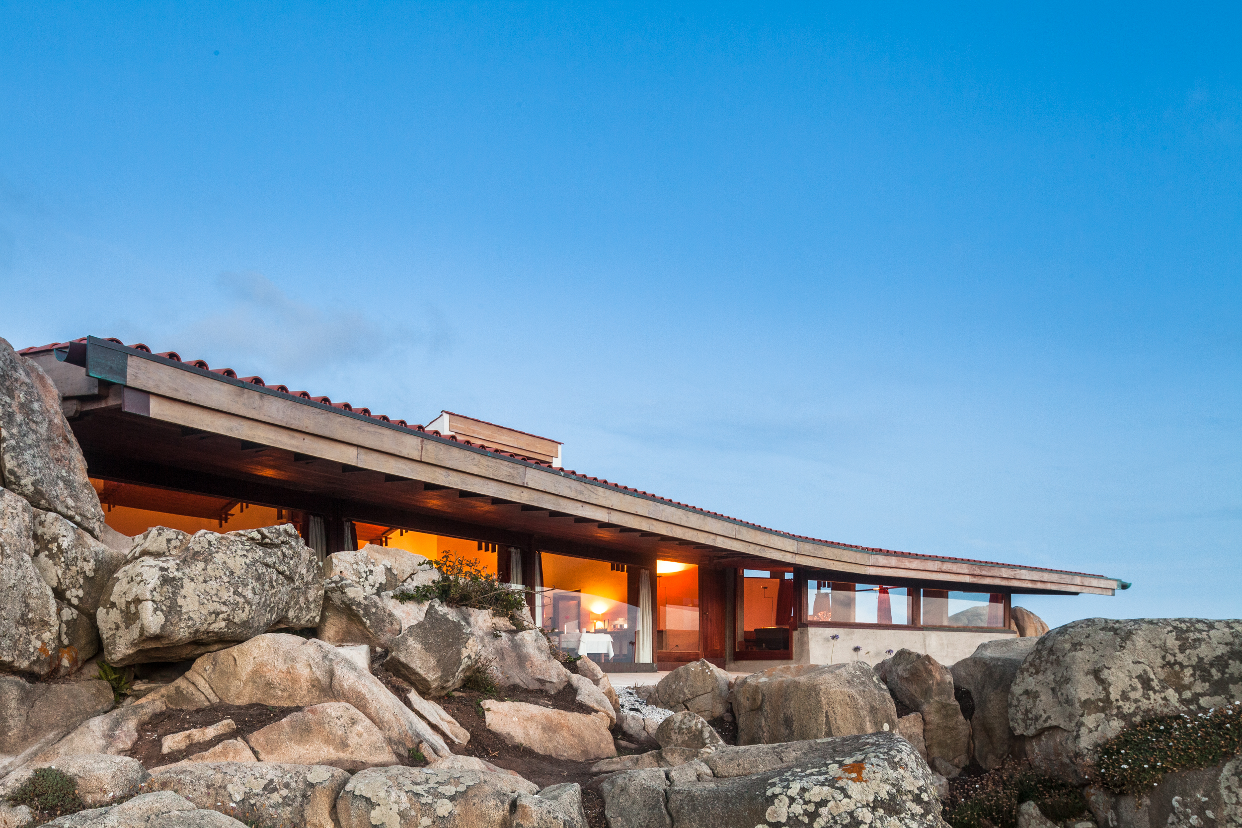 Boa Nova Tea House by Álvaro Siza, timber roof detail leaning over the Atlantic rocks in Leça da Palmeira