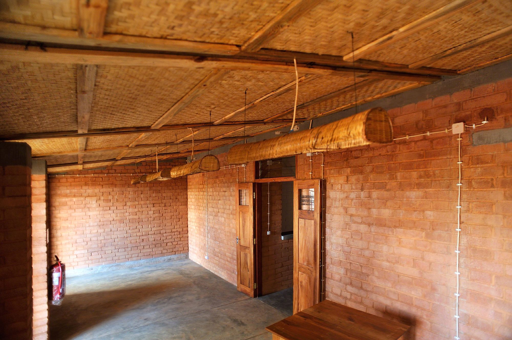 bamboo ceilings and bamboo lamps red earthen walls