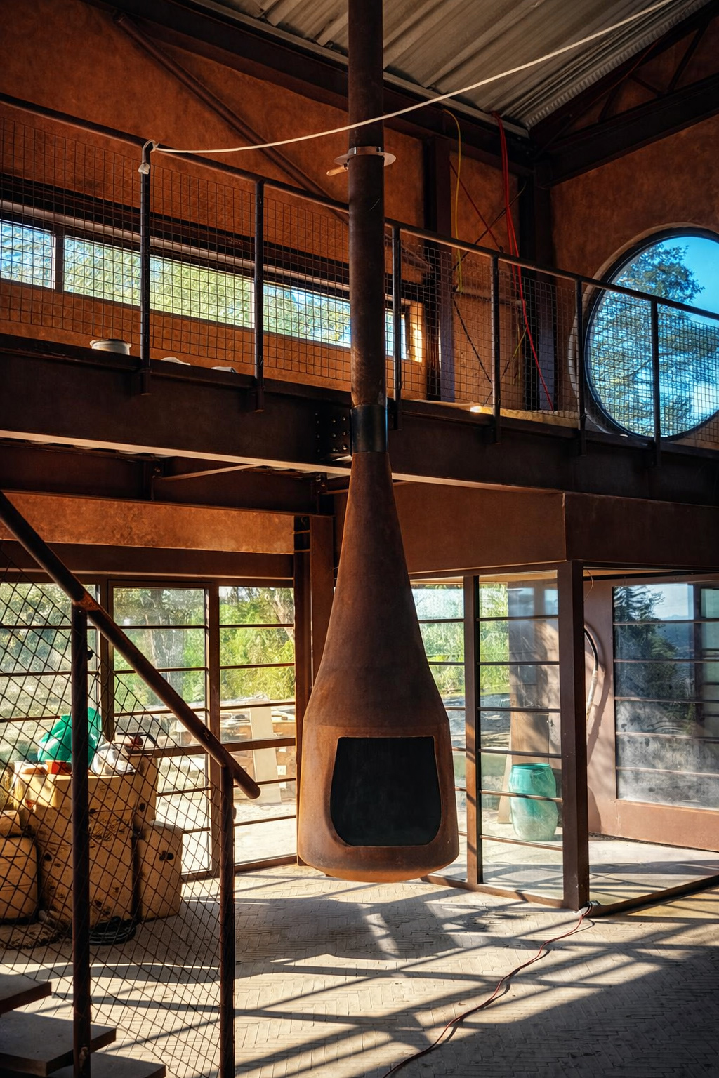 Steel suspended fireplace installed in interior space, Project Outeiro, CAS Studio