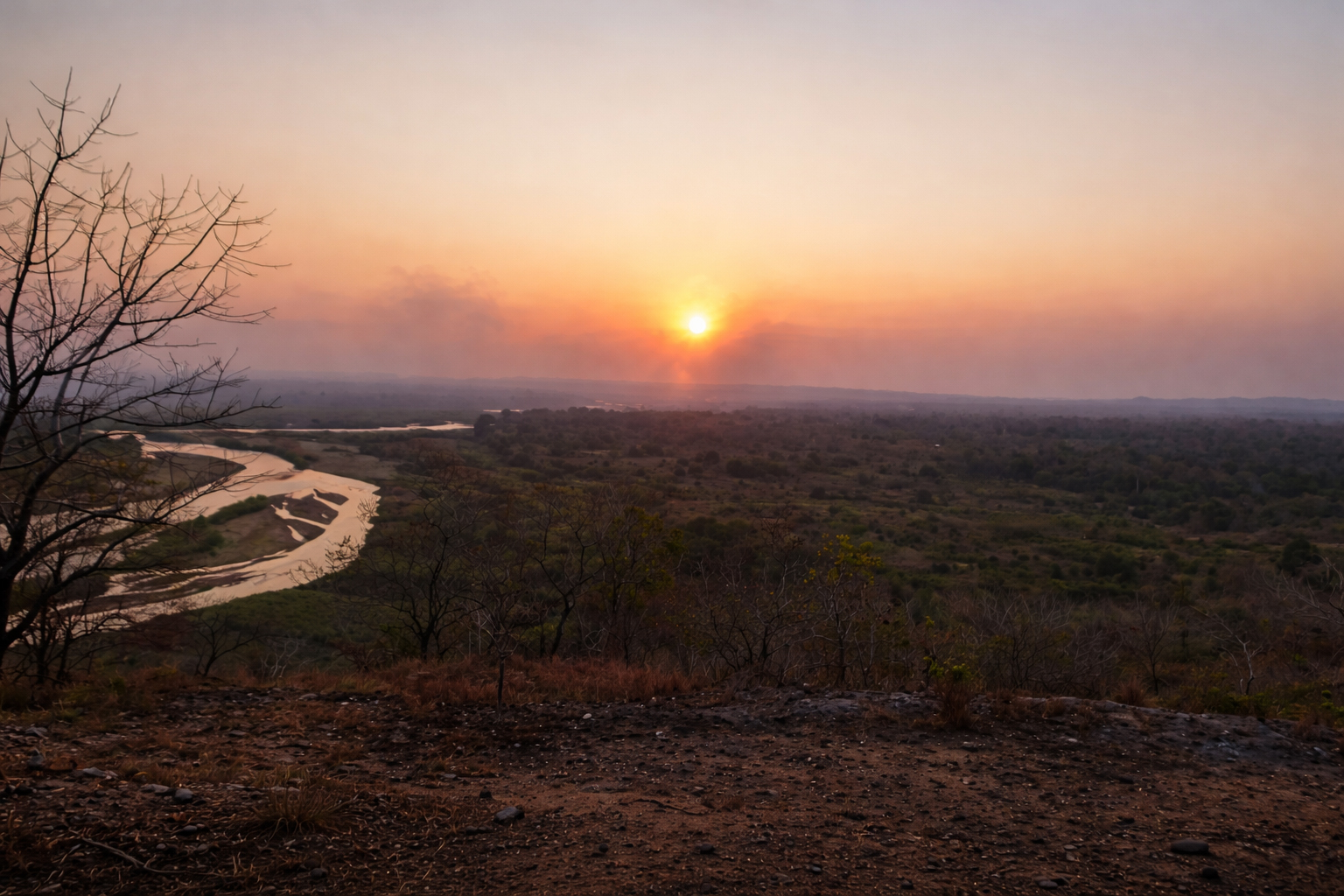 Meandering river at sunset across Gorongosa National Park landscape