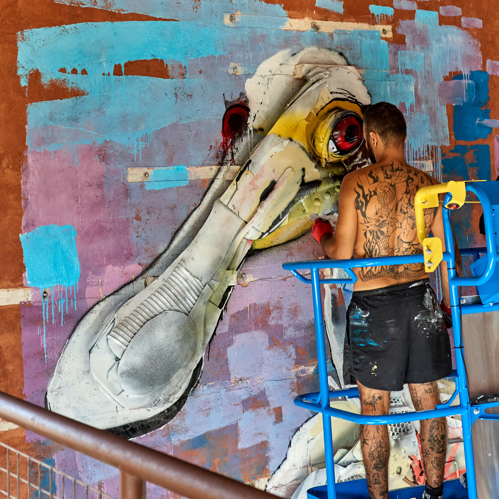 Detail of Bordalo II creating the Spoonbill artwork from recycled materials at Project Outeiro, Alcácer do Sal.